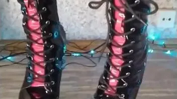 Dominatrix Poses in Latex and Goth Heels